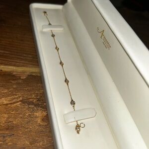 14k Gold diamond bracelet.